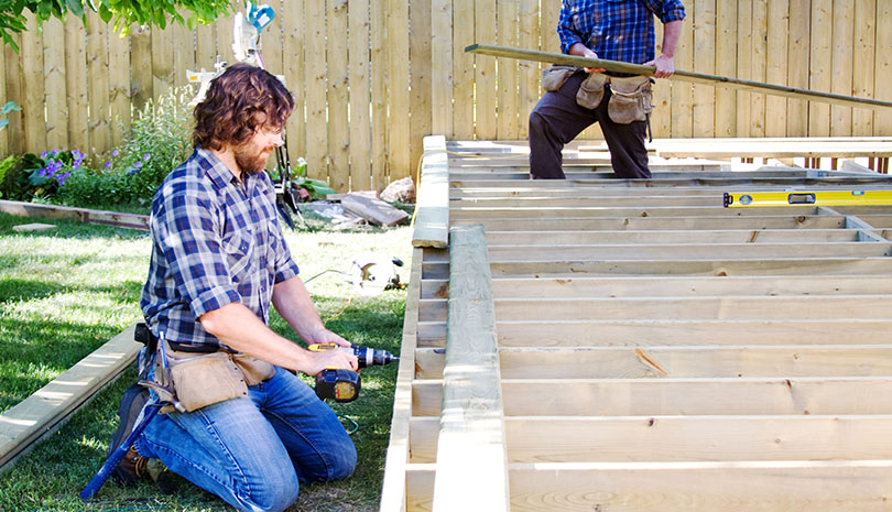 QRHI exterior remodelers working outside